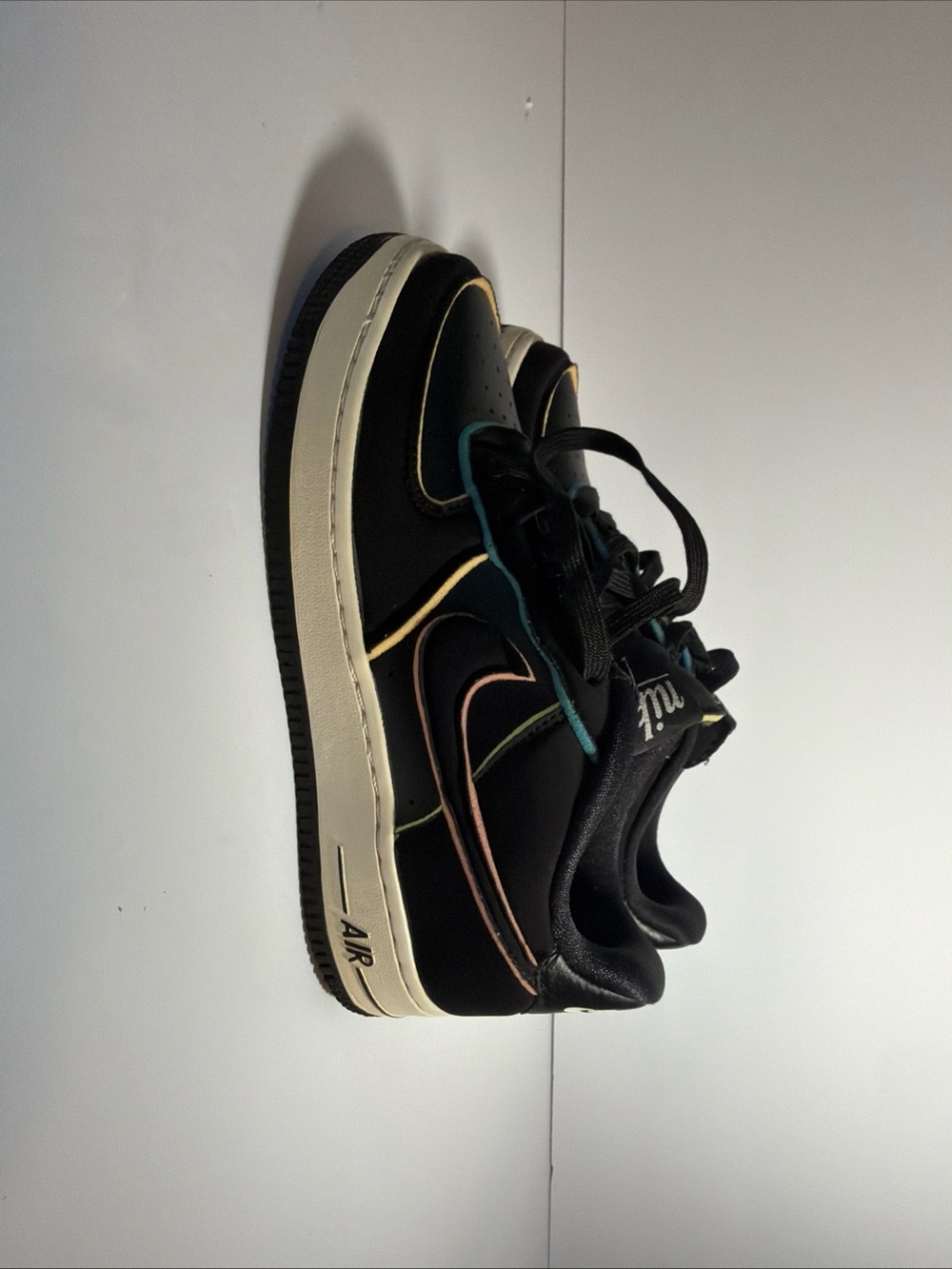 Nike Kids Black Sneakers with Pastel Multi-Accent Trim